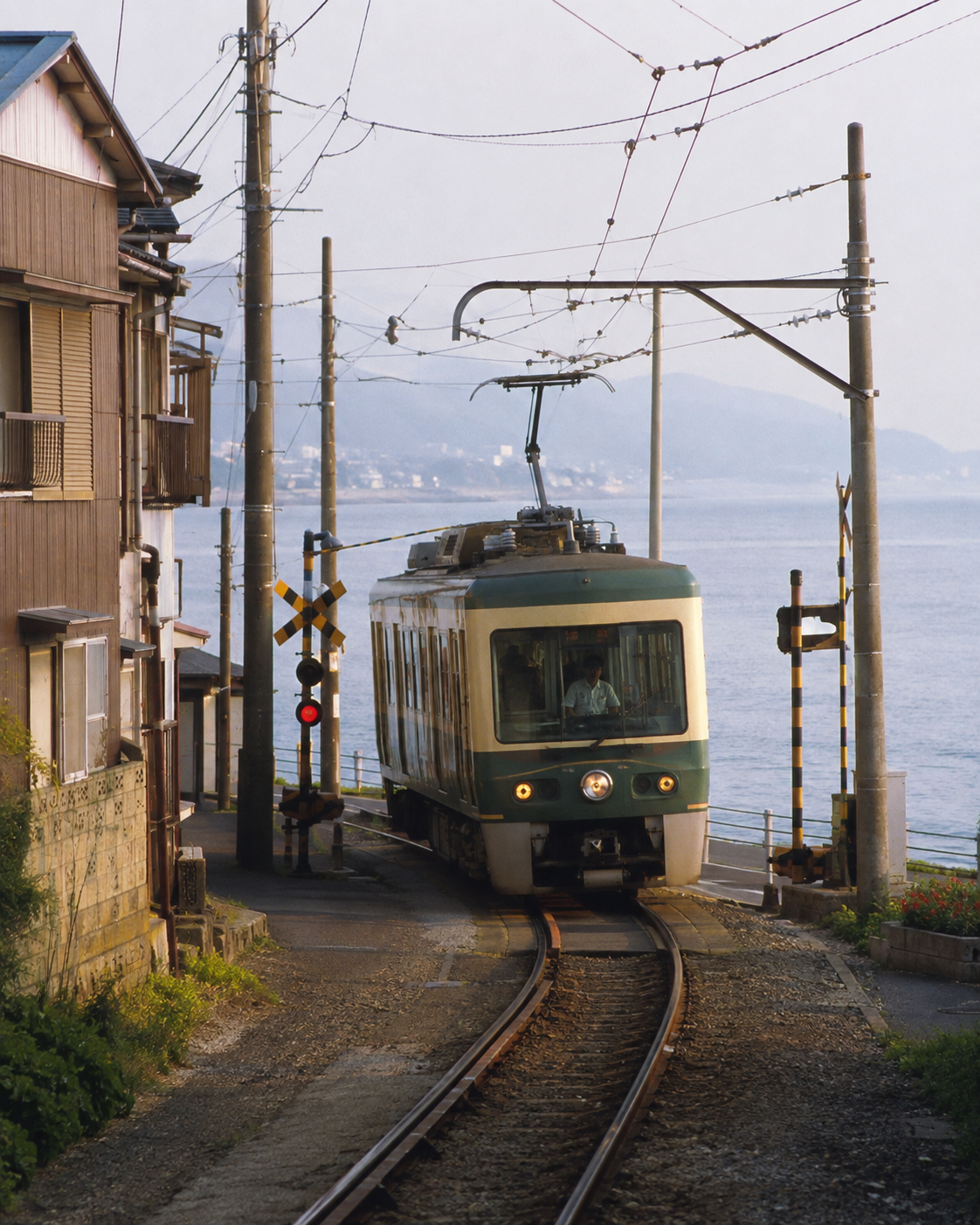 Coastal tram illustration used for the app’s 2003 camera era